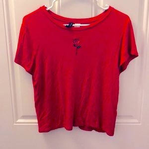Red t-shirt with rose stitching